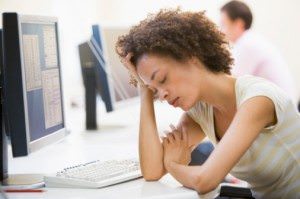 woman-tired-at-work-madamenoire.com