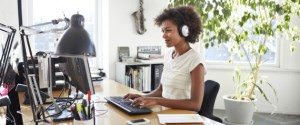 What do you listen to at work - Photo credit: huffingtonpost.co.uk