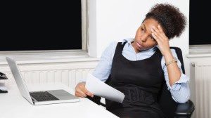 052114-b-real-forgivness-woman-unhappy-worker-office-career-disgruntled-work-stress